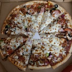 Ken's Pizza Parlor - Supreme pizza was super gross. Don't waste your money here.
