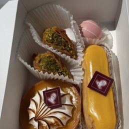 Passionfruit mango tart, eclair, cake pop bite, baklava