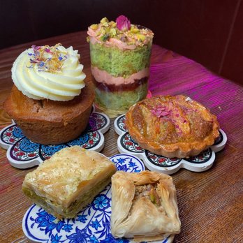 Pistachio Cafe - Birds Nest Pistachio Pistachio Orange Blossom Strawberry artisan gateaux Peach Pistachio Tart Traditional Baklava Pistachio Carrot Cupcake - Coffee & Tea Near Me - New Haven, Connecticut