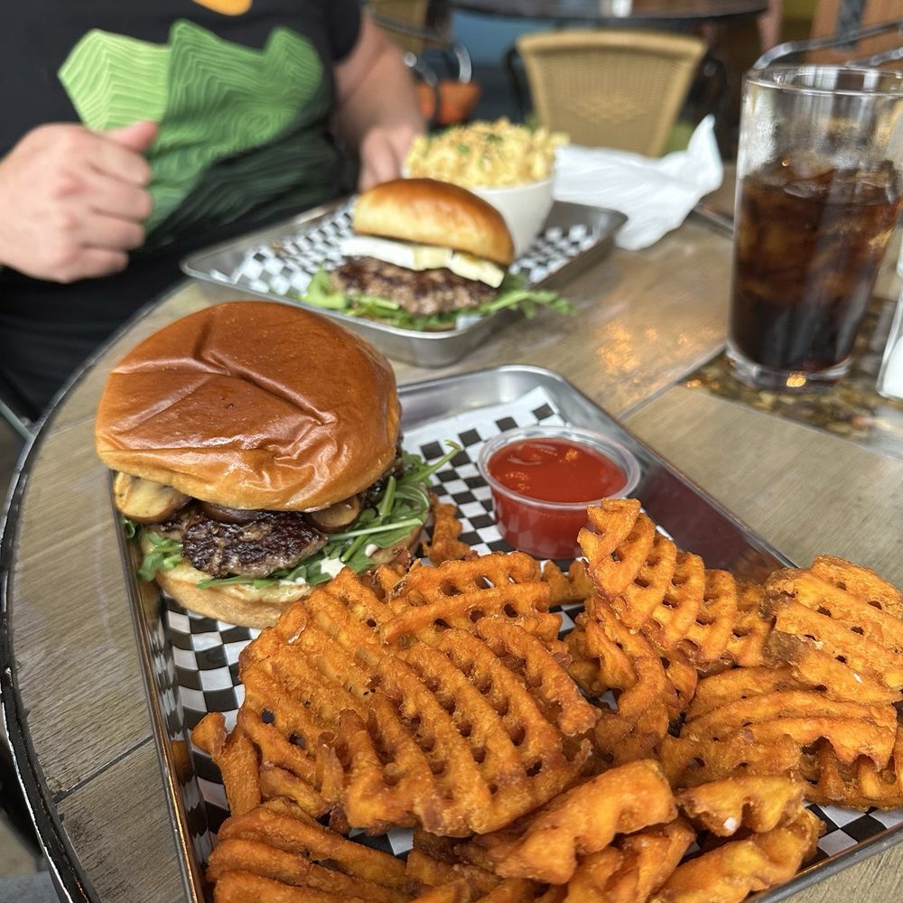 The Kosmos - Miso burger with sweet potato fries and green chile Brie burger with Mac and cheese - Bars Near Me - Albuquerque, New Mexico