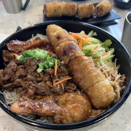 House special vermicelli with extra spring roll. House special vermicelli with extra spring roll.