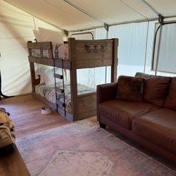 Roscoe Campsite Park - Glamping in one of their tents... Bunk bed off to the side for kids.