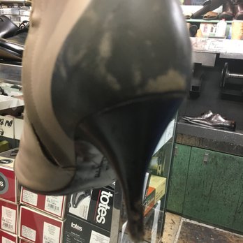 Fernandez Shoe Repair - Before the magic-badly scuffed boots - Shoe Repair Near Me - New York, New York
