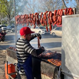 a man cooking meat