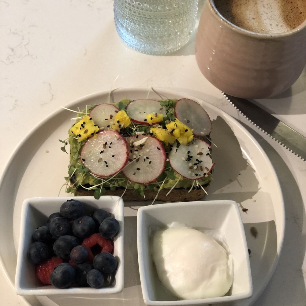 Flora Jean's - Avocado toast with poached egg and fresh fruit. - Tacos Near Me - Little Rock, Arkansas