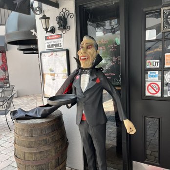 Dracula's Legacy Wine Bar - Count Dracula greeting you. - Wine Bars Near Me - St. Petersburg, Florida