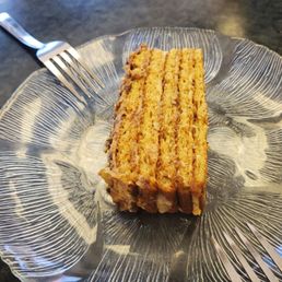 a piece of cake on a glass plate a piece of cake on a glass plate