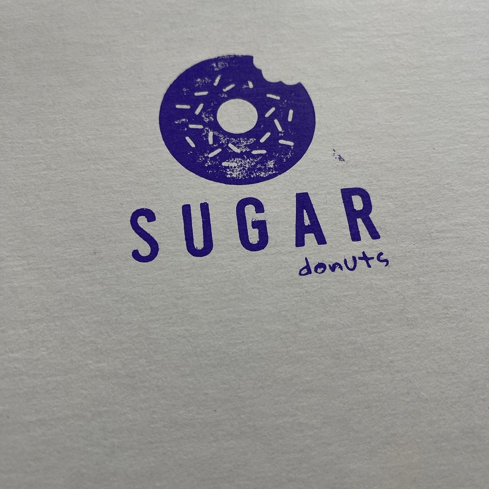 Sugar Donuts - Who doesn't love a stamped logo donut box?.... what's inside is what counts! And this certainly did not disappoint. - Donuts Near Me - Charlotte, North Carolina Sugar Donuts - Who doesn't love a stamped logo donut box?.... what's inside is what counts! And this certainly did not disappoint. - Donuts Near Me - Charlotte, North Carolina