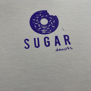 Sugar Donuts - Who doesn't love a stamped logo donut box?.... what's inside is what counts!  And this certainly did not disappoint. - Donuts Near Me - Charlotte, North Carolina