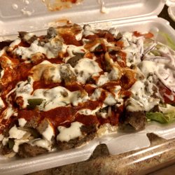 Lamb over rice w. salad, white & hot sauces! ($7)