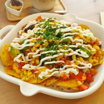 Cafe Maji - Bulgogi Nacho - super yummy! Comes with Korean style marinated beef on a bed of veggie and crispy nachos. - Coffee & Tea Near Me - Artesia, California Cafe Maji - Bulgogi Nacho - super yummy! Comes with Korean style marinated beef on a bed of veggie and crispy nachos. - Coffee & Tea Near Me - Artesia, California