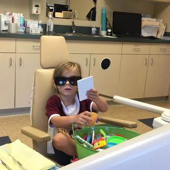 Pediatric Dental Center - Picking from the Treasure box after her cleaning - Pediatric Dentists Near Me - Frederick, Maryland