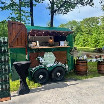 The Crafted Cocktail - Wedding Set up with Hydration Station and Champagne Wall - Food Trucks Near Me The Crafted Cocktail - Wedding Set up with Hydration Station and Champagne Wall - Food Trucks Near Me