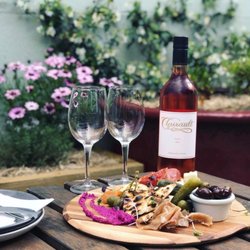 A Bite To Eat - Anitpasto and rose in the courtyard