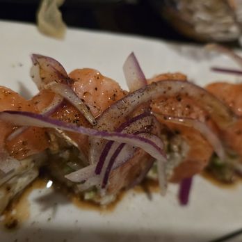 Zen Sushi - French Kiss Roll, dressed Cajun salmon,  spicy salmon,  crab meat,  avocado,  cucumber,  onion, mustard soy, truffle oil,  soy bean pepper - Sushi Bars Near Me - Dana Point, California