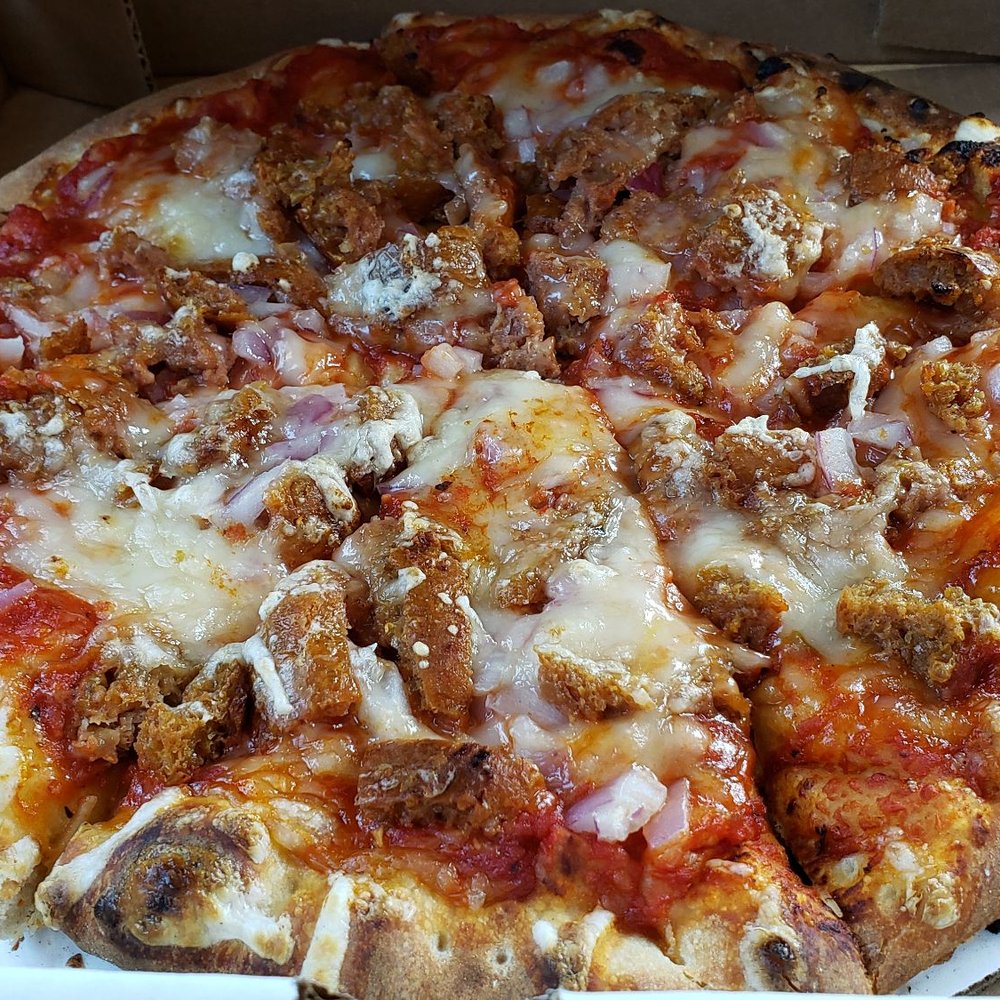 10" pizza w/Beyond sausage & Violife vegan mozzarella ($15). Excellent crust, nicely done. 10" pizza w/Beyond sausage & Violife vegan mozzarella ($15). Excellent crust, nicely done.