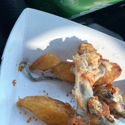 Fuel America Travel Center - Wings and fries and a nail found in the food
