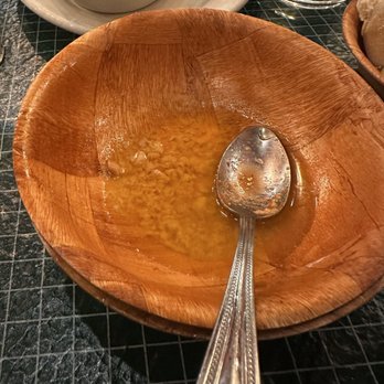 Provino's Italian Restaurant - The butter left at the bottom of the bowl from the rolls - Italian Near Me - Cumming, Georgia