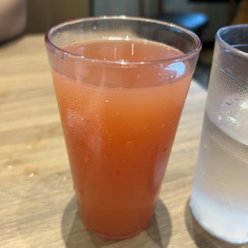 Stacked Pancake & Breakfast House - a glass of orange juice and a glass of water - Breakfast & Brunch Near Me - Langley Township, British Columbia Stacked Pancake & Breakfast House - a glass of orange juice and a glass of water - Breakfast & Brunch Near Me - Langley Township, British Columbia