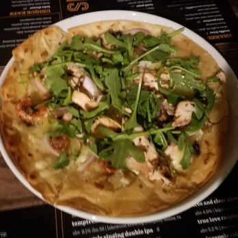 Smithy - smoked salmon pizza with a light, flaky crust,  dill,  arugula, and avocado - Breakfast & Brunch Near Me - Dallas, Texas