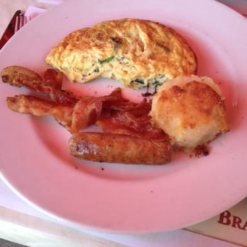 Bistro Cassis - Mushroom and spinach omelet with a healthy side of bacon and sausage and potato - French Near Me - Huntington, New York Bistro Cassis - Mushroom and spinach omelet with a healthy side of bacon and sausage and potato - French Near Me - Huntington, New York