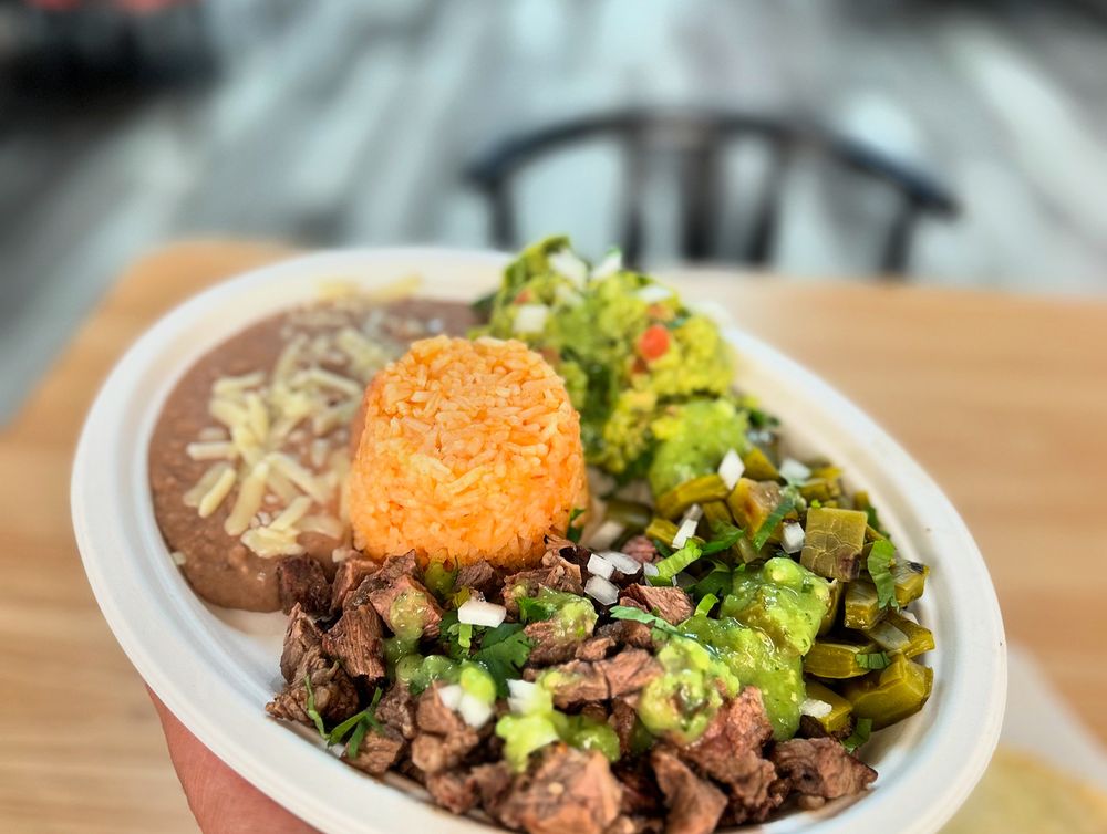 Tacos El Carnalito Logo