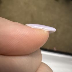 Sunny Nails - Edges along side of the nail are not smooth and separating. Cuticle edge is lifting after 10 days of growth.