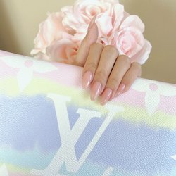 Rockstar Nails & Spa - Nude colored polish over pink acrylic powder by Kelly