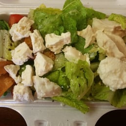 Fattoush with Feta cheese, hummus and toum.