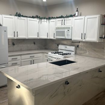 National Stone - Kitchen counter/backsplash/riser upgraded to Casablanca Quartzite. - Flooring Near Me - Las Vegas, Nevada National Stone - Kitchen counter/backsplash/riser upgraded to Casablanca Quartzite. - Flooring Near Me - Las Vegas, Nevada