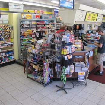 Norm's Minit Mart - a man shopping in a store - Convenience Stores Near Me - Hendersonville, North Carolina Norm's Minit Mart - a man shopping in a store - Convenience Stores Near Me - Hendersonville, North Carolina
