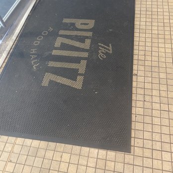 Ono Poke - a sign on the floor of a subway station - Hawaiian Near Me - Birmingham, Alabama
