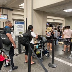 TSA Checkpoint 3 - Strollers and elderly have different line for faster service. Suddenly, everyone lined up there.