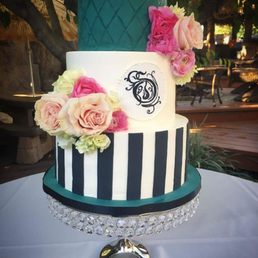 Our gorgeous wedding cake by Hillary and Heidi.