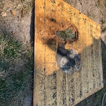 Strata Roofing and Construction - A hole big enough for a child to fit through!  Revealed when 9-year-old shingles were removed - Roofing Near Me - Katy, Texas