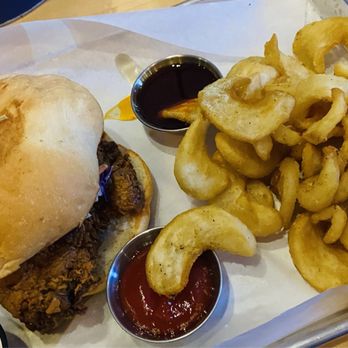 Jasper's - Crispy Hot Chicken Sandwich with wedges - New American Near Me - Nashville, Tennessee Jasper's - Crispy Hot Chicken Sandwich with wedges - New American Near Me - Nashville, Tennessee