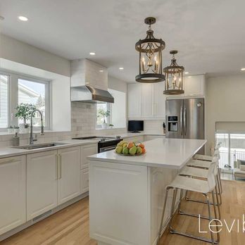 Levibart Group - Montreal West-Island, Beaconsfield, Kitchen Remodel with Quartz Countertops and Marble Backsplash. - General Contractors Near Me Levibart Group - Montreal West-Island, Beaconsfield, Kitchen Remodel with Quartz Countertops and Marble Backsplash. - General Contractors Near Me