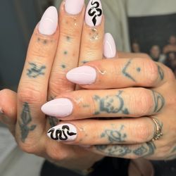 Cindy's Nails & Spa - Pink nails with a snake design