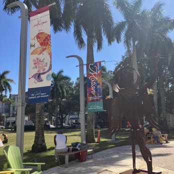 Cornell Art Museum - Sculpture outside and pennants advertising events... - Art Museums Near Me - Delray Beach, Florida