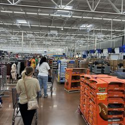 Walmart Supercenter - 4 registers open. 30 min waiting line.