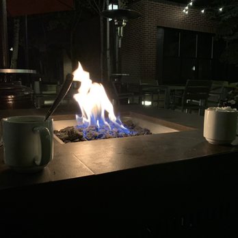 Limelight Hotel - Tea & coco by the fire in the Limelight courtyard - Hotels Near Me - Aspen, Colorado Limelight Hotel - Tea & coco by the fire in the Limelight courtyard - Hotels Near Me - Aspen, Colorado