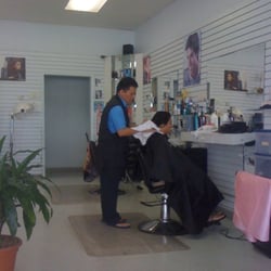 Tommy at work doing s ladies hair