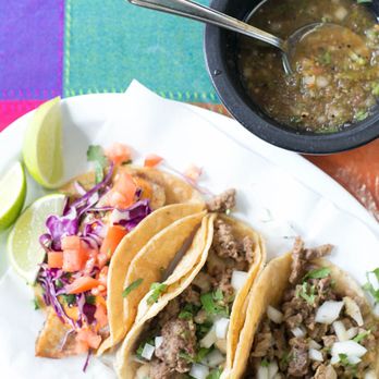 Mi Restaurante - [from left to right] Fish;  picadillo (ground beef) and steak tacos - Mexican Near Me - Mount Prospect, Illinois
