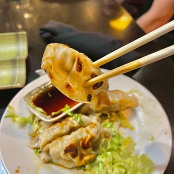 Fuji Japanese Steakhouse - a plate of food with chopsticks - Japanese Near Me - Middletown, New York Fuji Japanese Steakhouse - a plate of food with chopsticks - Japanese Near Me - Middletown, New York