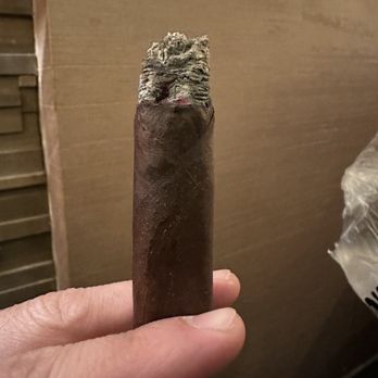 Davidoff of Geneva Brooklyn - a hand holding a cigar - Tobacco Shops Near Me - Brooklyn, New York Davidoff of Geneva Brooklyn - a hand holding a cigar - Tobacco Shops Near Me - Brooklyn, New York