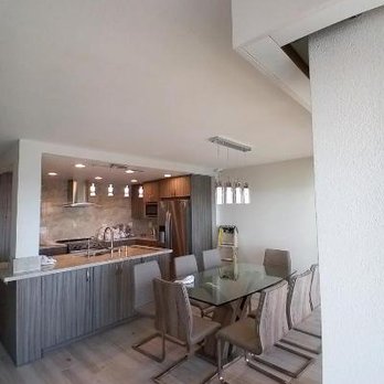 Kitchen Cabinets Express - Looking from ocean side of condo into new "open" kitchen with center island. Two different ways to enter kitchen. - General Contractors Near Me - Buena Park, California