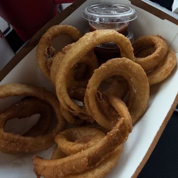 Starvin Marvin's Flatburgers - Tempura battered onion rings with BBQ sauce. Crispy, hot and well seasoned. - Burgers Near Me - Mohave Valley, Arizona Starvin Marvin's Flatburgers - Tempura battered onion rings with BBQ sauce. Crispy, hot and well seasoned. - Burgers Near Me - Mohave Valley, Arizona