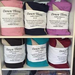 Warm Things - Six brand new colors of our ever popular cuddly Down Throws. Wonderful gifts to use on the sofa or keep warm by the camp fire.