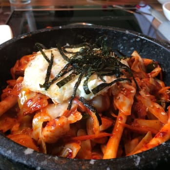 Masijta Grill - Seafood Dolsot Bi-Bim-Bap in a hot stone bowl $12.99 at lunch; mostly squid. - Korean Near Me - Urbana, Illinois Masijta Grill - Seafood Dolsot Bi-Bim-Bap in a hot stone bowl $12.99 at lunch; mostly squid. - Korean Near Me - Urbana, Illinois