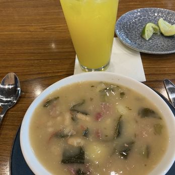 Padrino's Cuban Restaurant - Caldo Gallego with natural mango lemonade. - Cuban Near Me - Plantation, Florida
